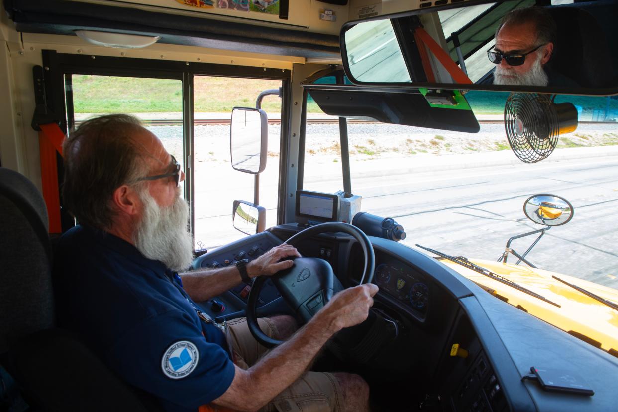 Bus driver Dave Dragan maneuvers Moorpark Unified School District's first all-electric school bus during a test ride in April 2023.