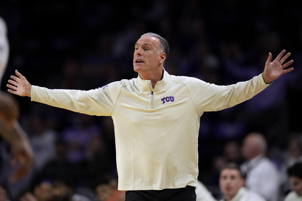 TCU head coach Jamie Dixon reacts to a call during the first half of an NCAA college basketball game against Kansas State Tuesday, Feb. 7, 2023, in Manhattan, Kan. (AP Photo/Charlie Riedel)