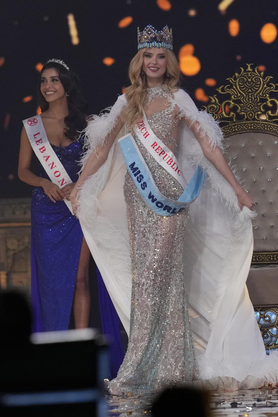 Krystyna Pyszková of Czech Republic walks on stage after she was crowned Miss World in Mumbai, India, Saturday, Mar. 9, 2024. (AP Photo/Rajanish Kakade)