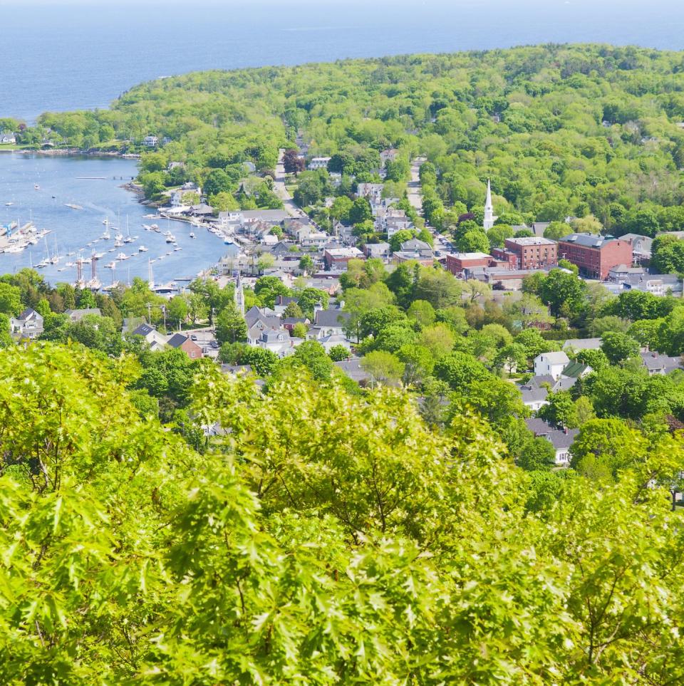 <p>Camden is the quintessential Maine getaway but it's also a fantastic place to live. The seaport town doesn't shut down after the tourist season. Take in a performance at the <a href="https://www.camdenmaineexperience.com/content/membersm/memberdetail?mode=detail&uid=8" rel="nofollow noopener" target="_blank" data-ylk="slk:Camden Opera House;elm:context_link;itc:0;sec:content-canvas" class="link ">Camden Opera House</a>, or pick up a great book at the exquisite <a href="https://www.camdenmaineexperience.com/content/membersm/memberdetail?mode=detail&uid=23" rel="nofollow noopener" target="_blank" data-ylk="slk:Camden Public Library;elm:context_link;itc:0;sec:content-canvas" class="link ">Camden Public Library</a> (located right on the harbor). </p>