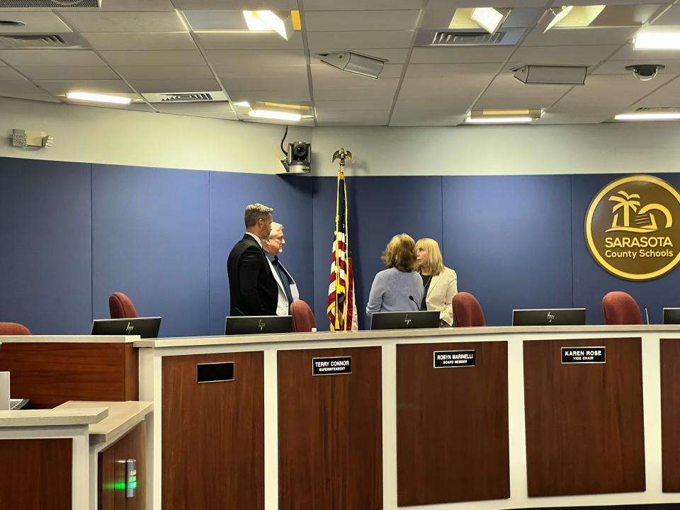 Sarasota Superintendent Terry Connor and School Board members Tom Edwards, Robyn Marinelli and Karen Rose huddle for discussion following a recess called by Chairwoman Bridget Ziegler.