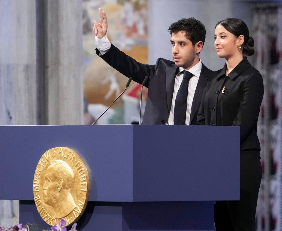 Kiana Rahmani, right, and Ali Rahmani attend the awarding of the Nobel Peace Prize for 2023 in Oslo City Hall, Oslo, Norway, Sunday, Dec. 10, 2023. The children of imprisoned Iranian activist Narges Mohammadi, Ali Rahmani and Kiana Rahmani are to accept this year’s Nobel Peace Prize on her behalf. Mohammadi is renowned for campaigning for women’s rights and democracy in her country. (Javad Parsa/NTB via AP)