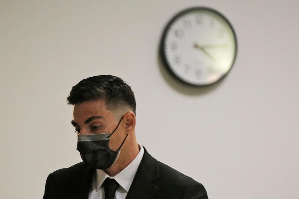 Christopher Smelser, 29, prepares to leave a hearing 
on Wednesday, May 25, 2022. Smelser is set to face a jury trial on July 11, 2022.