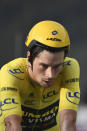 Slovenia's Primoz Roglic who lost the overall leader's yellow jersey to fellow countryman Tadej Pogacar, crosses the finish line of stage 20 of the Tour de France cycling race, an individual time trial over 36.2 kilometers (22.5 miles), from Lure to La Planche des Belles Filles, France, Saturday, Sept. 19, 2020. (Marco Bertorello/Pool via AP)