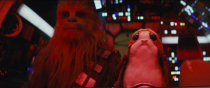 <p>Another of the island’s inhabitants are the penguin-like porgs, one of which is seen here with Chewbacca (Peter Mayhew).<br>(Credit: Lucasfilm) </p>