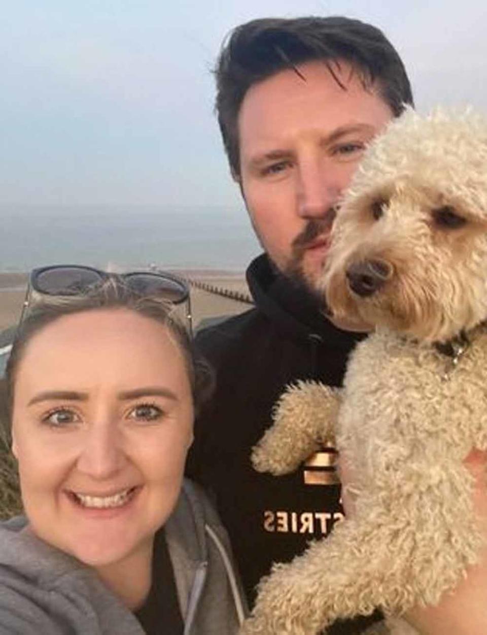 Sarah with her husband and Lenny by the beach (PA Real Life)