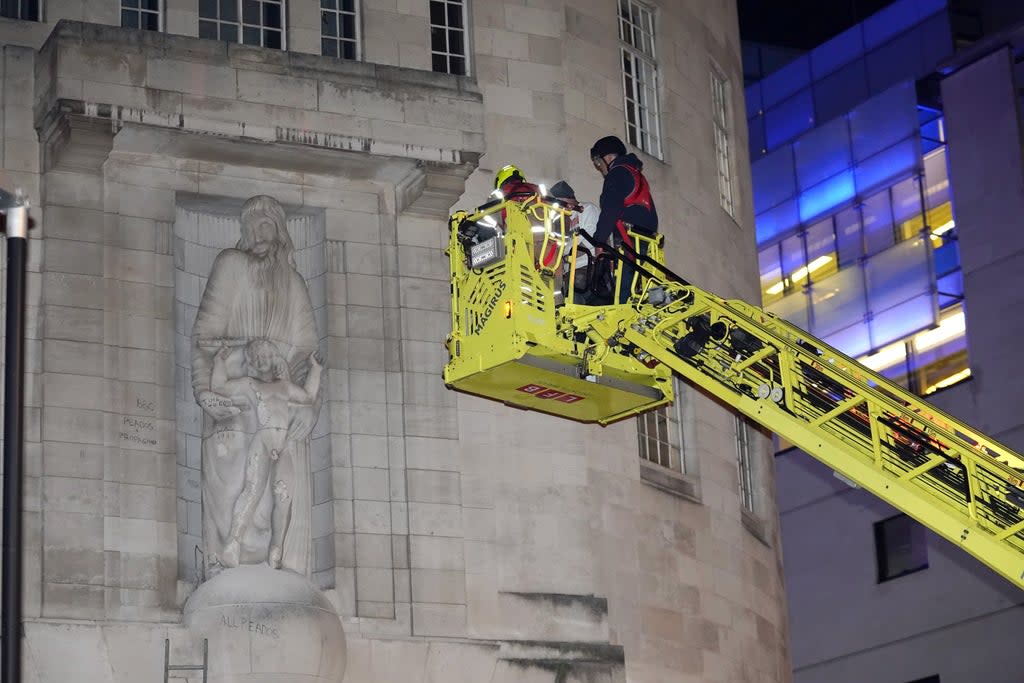 A cherry picker is seen being used during the incident on Wednesday evening (Ian West/PA) (PA Wire)