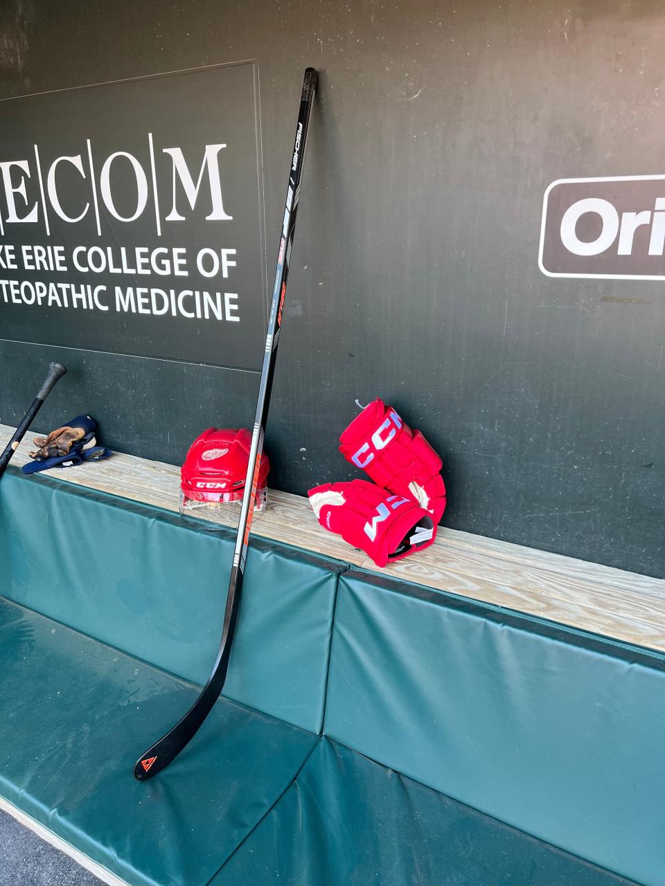 Hockey gear from the Detroit Red Wings, used by the Detroit Tigers for home run celebrations, sits in the visitor's dugout Friday, April 21, 2023, at Camden Yards at Orioles Park in Baltimore, Maryland.