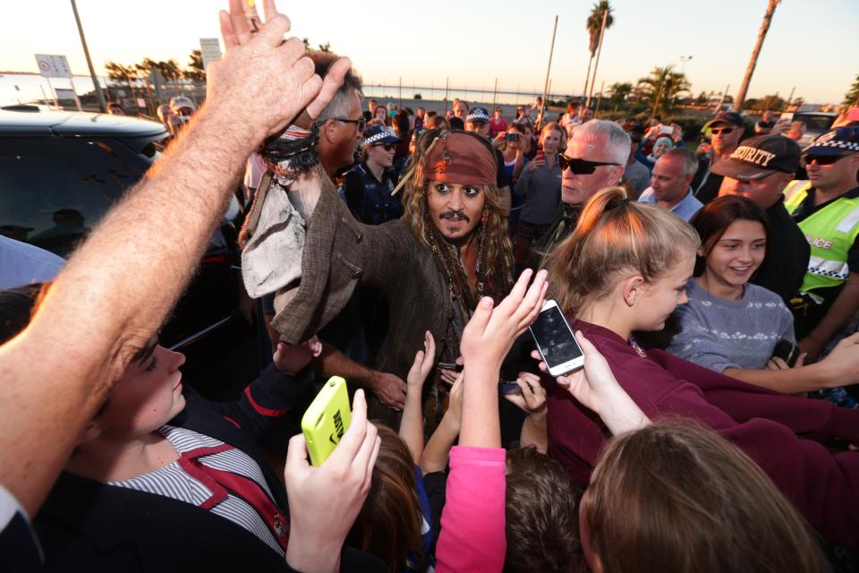 CLEVELAND, AUSTRALIA - JUNE 2: (EUROPE AND AUSTRALASIA OUT) American actor Johnny Depp, dressed as 'Captain Jack Sparrow', greets locals at Cleveland in Redland City, Queensland, after a day of filming 'Pirates of the Caribbean: Dead Men Tell No Tales'. (Photo by Peter Wallis/Newspix/Getty Images)