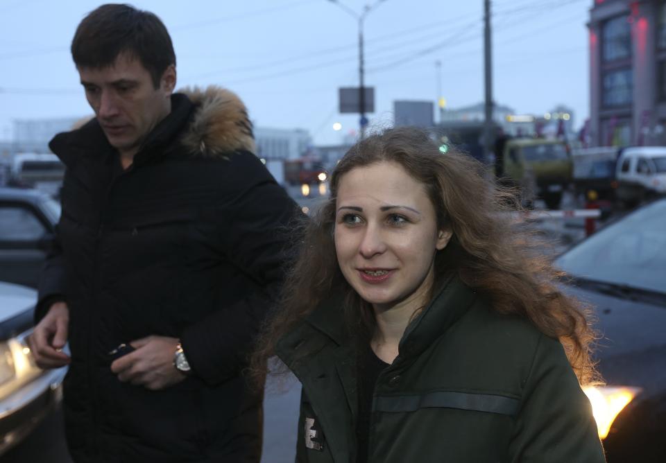 Alyokhina, member of Russian punk band Pussy Riot, speaks to the media at a train station in Nizhny Novgorod