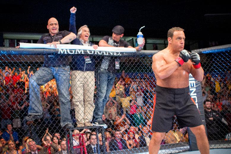 This film image released by Columbia Picturers shows, from left, Bas Rutten, Henry Winkler, Mark Dellagrotte and Kevin James in a scene from "Here Comes the Boom." (AP Photo/Columbia-Sony Pictures, Tracy Bennett)