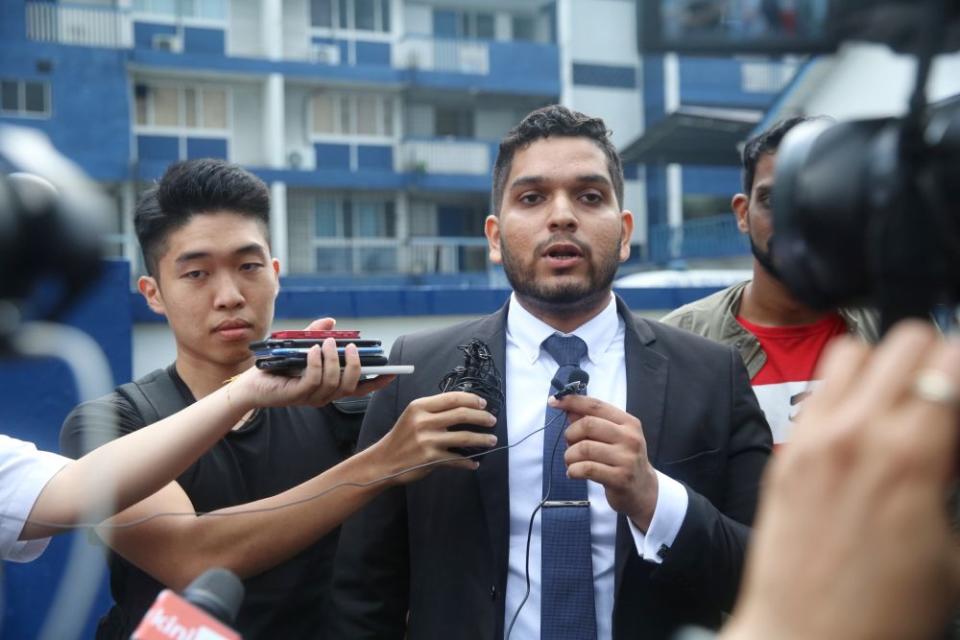 Former student activist Asheeq Ali speaks to reporters outside the Petaling police station in Kuala Lumpur October 16, 2019.— Picture by Choo Choy May