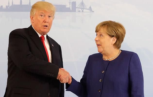 Merkel looks shocked at something Trump said. Photo: AAP