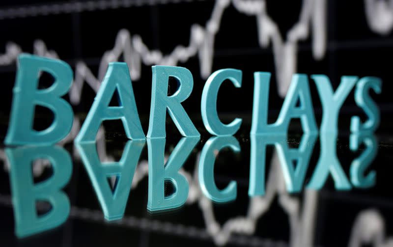 The Barclays logo is seen in front of displayed stock graph in this illustration