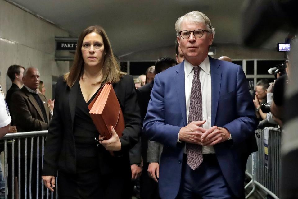 Manhattan District Attorney Cyrus Vance Jr., and Assistant District Attorney Joan Illuzzi leave court in New York after Harvey Weinstein was sentenced on March 11, 2020.