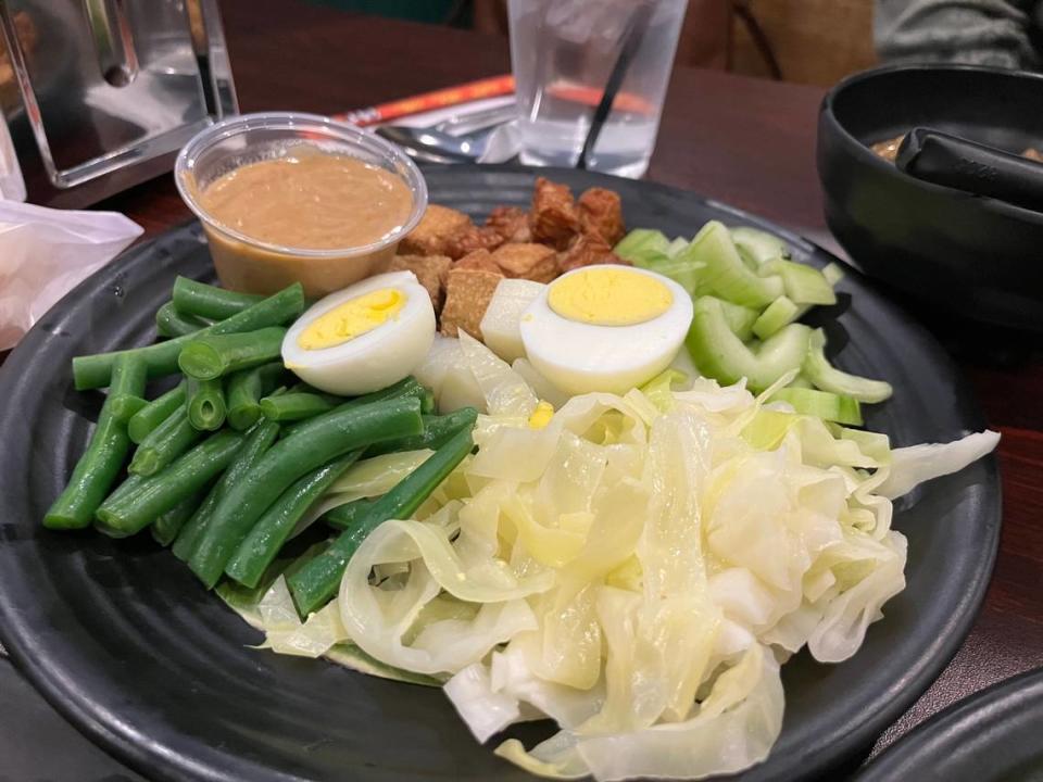 Nusa’s Indonesian salad — called gado gado — includes boiled green beans and cabbage, a boiled egg, fried tofu and tempeh, fresh cucumber and peanut sauce ($10).