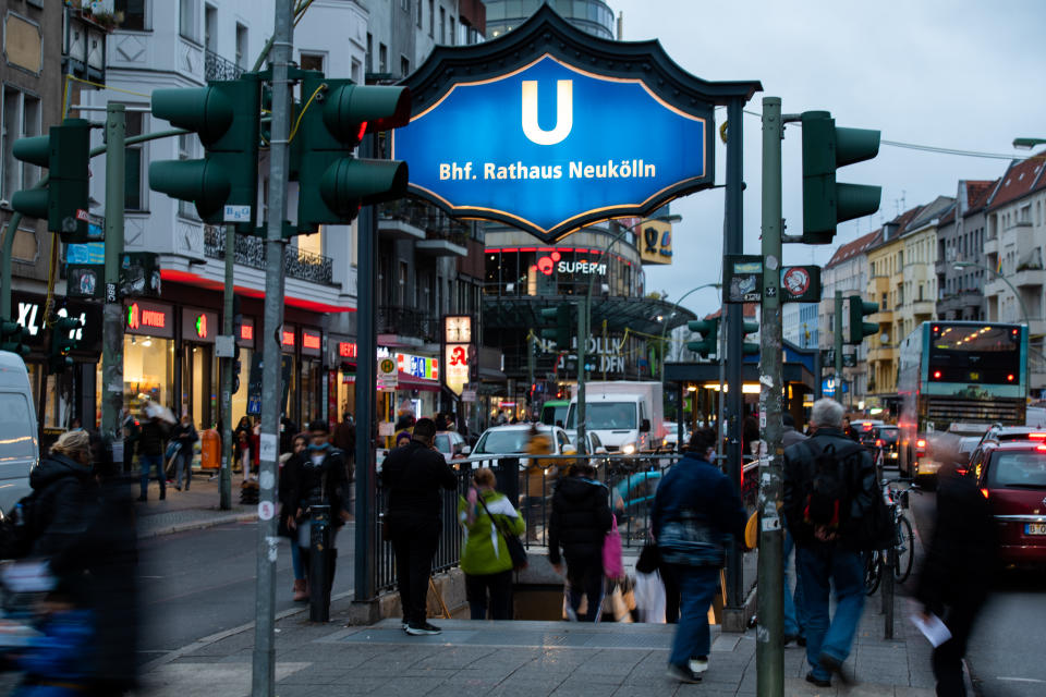 15 October 2020, Berlin: People go to the underground station Rathaus Neukölln. In Neukölln, the number of coronavirus infections has been rising for several days. Photo: Christophe Gateau/dpa (Photo by Christophe Gateau/picture alliance via Getty Images)