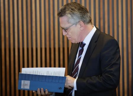 German Interior Minister Thomas de Maiziere attends a meeting at the Emergency Operations Center, after German authorities have launched the joint anti-terror exercise GETEX of police and the military, at the Interior Ministry in Berlin, Germany March 7, 2017. REUTERS/Markus Schreiber/POOL