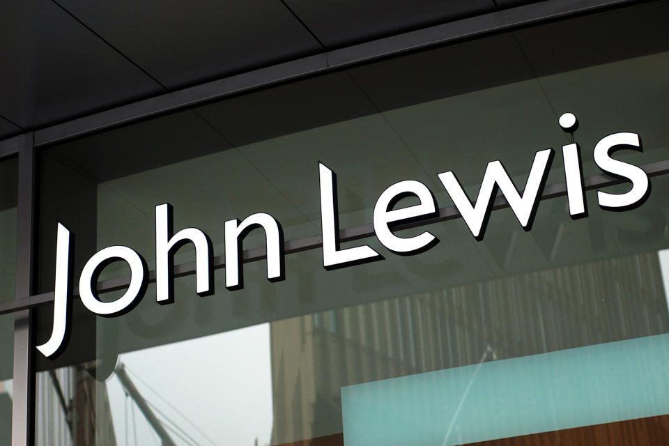 Liverpool, England - February 19, 2011: The sign of John Lewis store in Liverpool. John Lewis is chain of upmarket department stores operating throughout Great Britain.