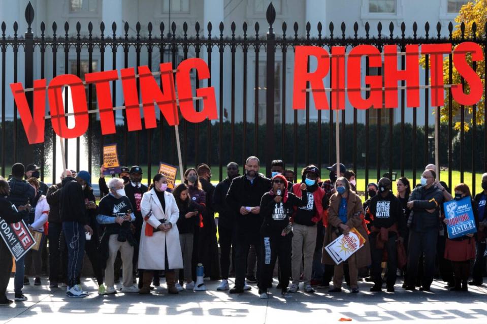 Demonstrators demanding voting rights protest in front of the White House in Washington, DC, on November 17, 2021. (Photo by Jim WATSON / AFP) (Photo by JIM WATSON/AFP via Getty Images)