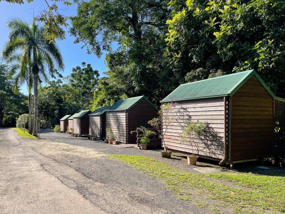 A row of tiny houses at Paronella Park.