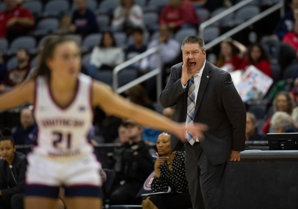 Southern Indiana Head Coach Rick Stein calls out as the University of Southern Indiana Screaming Eagles play the Eastern Illinois Panthers during the semifinal round of the 2024 Ohio Valley Conference Women’s Basketball tournament at Ford Center in Evansville, Ind., Friday, March 8, 2024.