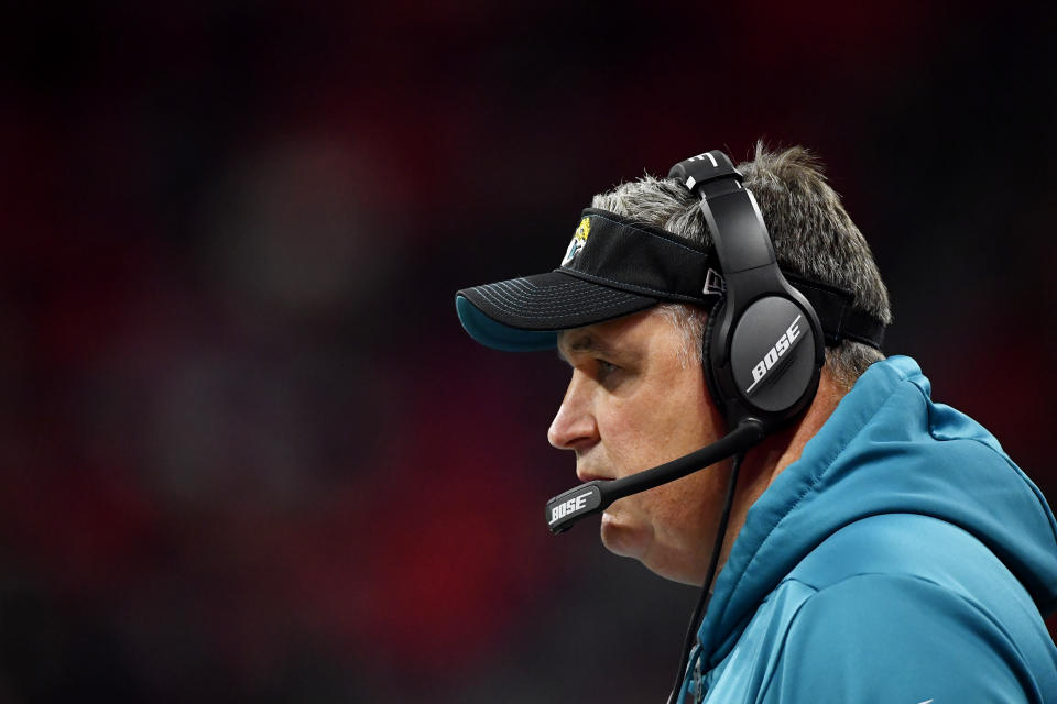 Jacksonville Jaguars head coach Doug Marrone works during the second half of an NFL football game against the Atlanta Falcons, Sunday, Dec. 22, 2019, in Atlanta. (AP Photo/John Amis)