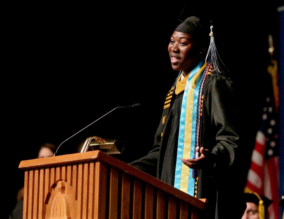 Antone Evans Jr. adresses fellow graduates during the University of Illinois Springfield's 51st annual commencement ceremony on Saturday at the BOS Center. [Thomas J. Turney/The State Journal-Register]