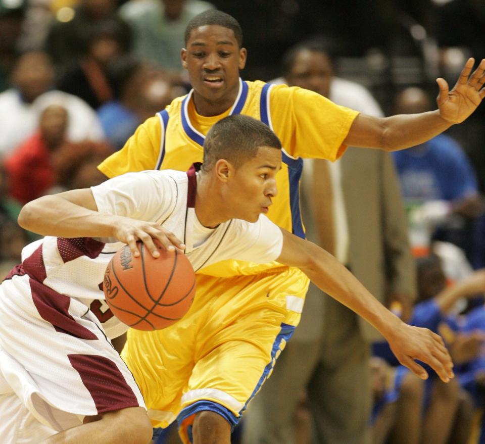 Pershing's Benjamin Richbow defends against Devin Oliver for Kalamazoo Central during second-half action in the Class A Finals on March 28, 2009, at the Breslin Center.