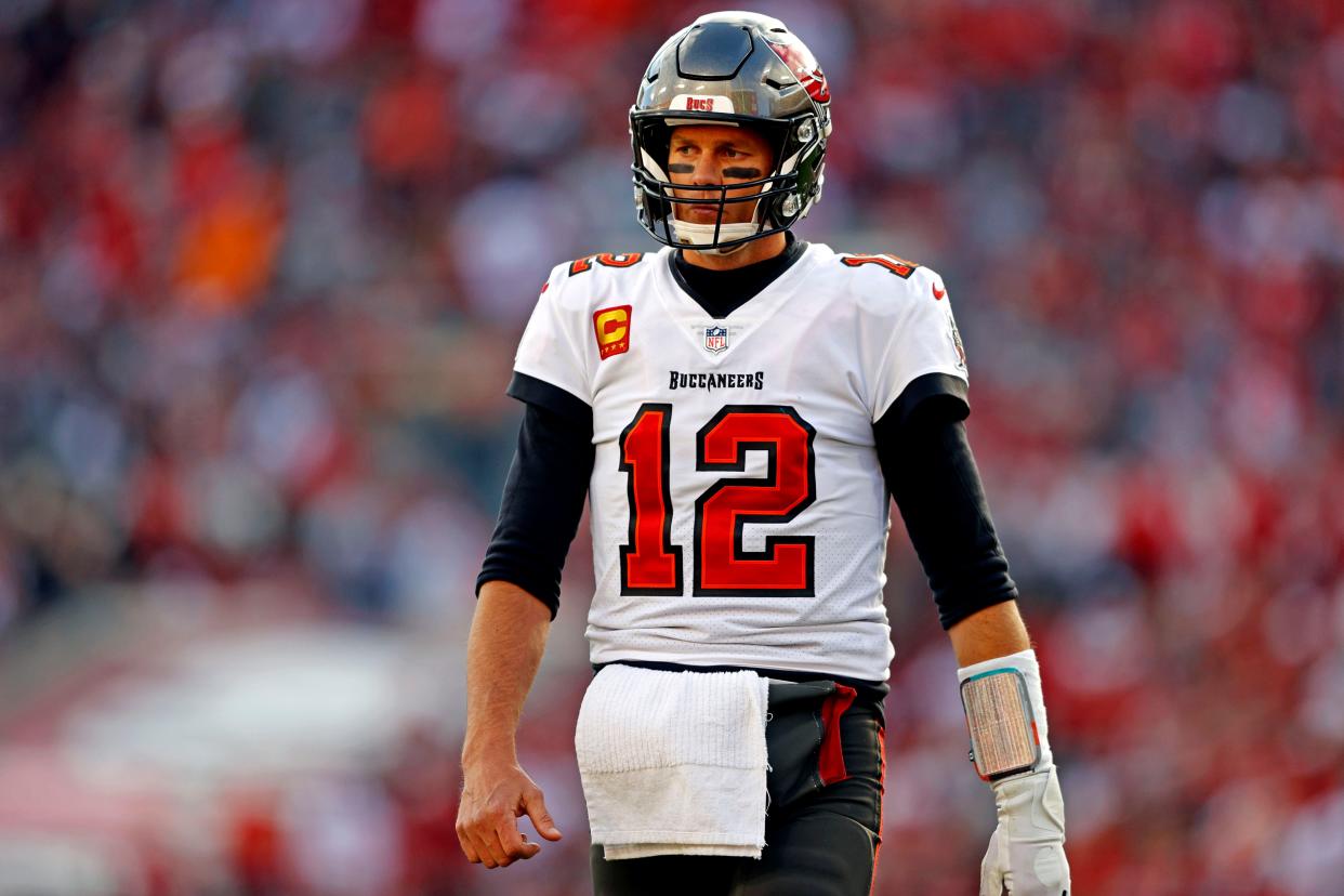 Tampa Bay Buccaneers quarterback Tom Brady (12) reacts during the first half against the Los Angeles Rams in a NFC Divisional playoff football game at Raymond James Stadium.