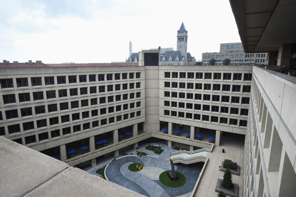 The courtyard of the FBI's J. Edgar Hoover building with the Old Post Office building, which houses the Trump International Hotel, in the background. (Photo: The Washington Post via Getty Images)