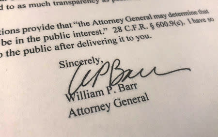 U.S. Attorney General William Barr's signature is seen on a copy of his letter to U.S. lawmakers stating that the investigation by Special Counsel Robert Mueller has been concluded and that Mueller has submitted his report to the Attorney General in Washington, U.S. March 22, 2019. REUTERS/Jim Bourg