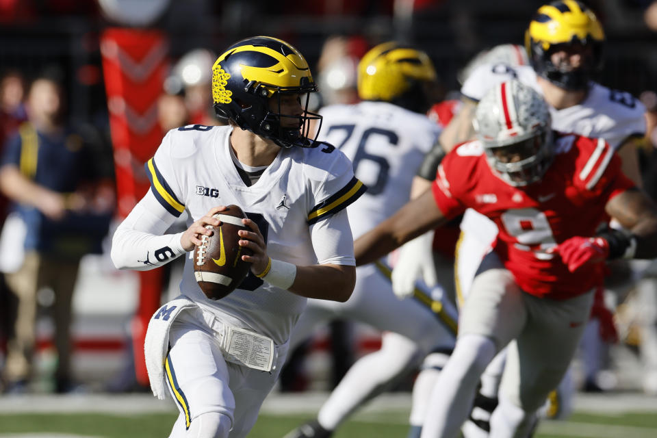 Michigan quarterback J.J. McCarthy drops back to pass against Ohio State during the first half of an NCAA college football game on Saturday, Nov. 26, 2022, in Columbus, Ohio. (AP Photo/Jay LaPrete)