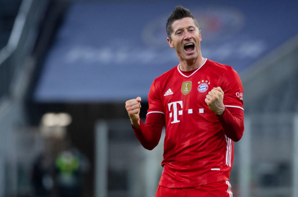 06 March 2021, Bavaria, Munich: Football: Bundesliga, Bayern Munich - Borussia Dortmund, Matchday 24 at Allianz Arena. Robert Lewandowski of Munich celebrates his goal to make it 4:2. Photo: Sven Hoppe/dpa - IMPORTANT NOTE: In accordance with the regulations of the DFL Deutsche FuÃŸball Liga and/or the DFB Deutscher FuÃŸball-Bund, it is prohibited to use or have used photographs taken in the stadium and/or of the match in the form of sequence pictures and/or video-like photo series. (Photo by Sven Hoppe/picture alliance via Getty Images)