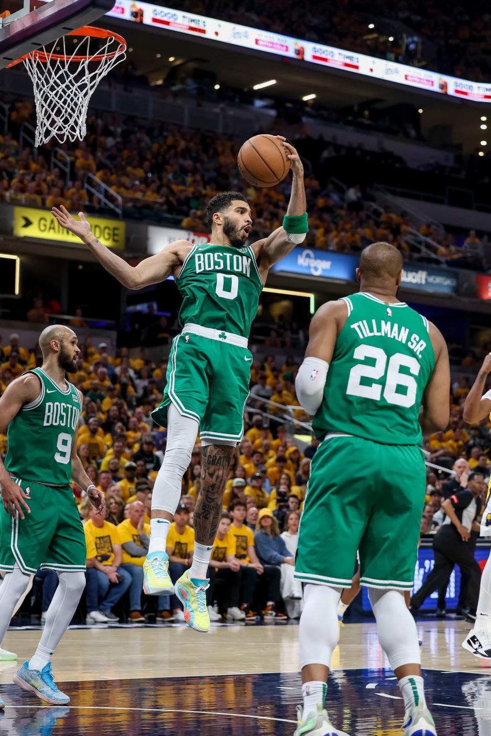 The Boston Celtics' Jayson Tatum (0) attempts to shoot the ball during Game 4.