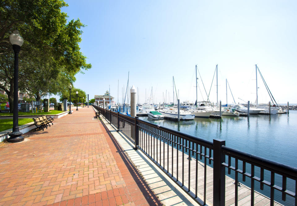 Photo of brick pathway and water