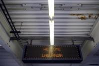 A view of an entrance to a parking garage at the central terminal of LaGuardia Airport in the Queens borough of New York April 8, 2014. REUTERS/Shannon Stapleton