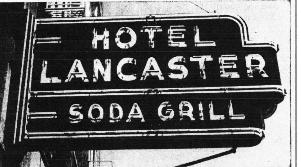 This sign hung from the east side of the Hotel Lancaster when it opened. Photo from the E-G on June 3, 1940.