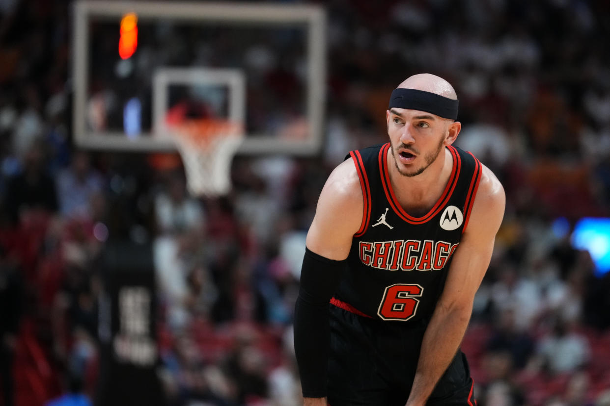 MIAMI, FLORIDA - APRIL 19: Alex Caruso #6 of the Chicago Bulls looks on against the Miami Heat in the first quarter during the Play-In Tournament at Kaseya Center on April 19, 2024 in Miami, Florida. NOTE TO USER: User expressly acknowledges and agrees that, by downloading and or using this photograph, User is consenting to the terms and conditions of the Getty Images License Agreement. (Photo by Rich Storry/Getty Images)