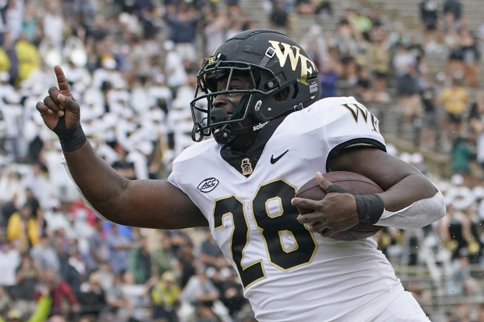 Wake Forest running back Quinton Cooley scores a touchdown on a 24-yard run against Vanderbilt in the second half of an NCAA college football game Saturday, Sept. 10, 2022, in Nashville, Tenn. Wake Forest won 45-25. (AP Photo/Mark Humphrey)