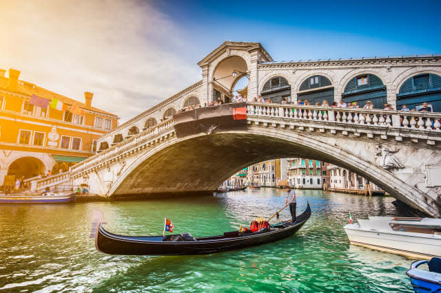 Venice asks tourists not to linger on bridges or swim in canals