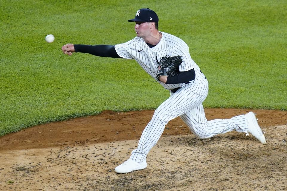 FILE - New York Yankees relief pitcher Scott Effross pitches during the seventh inning of an MLB baseball game against the Seattle Mariners on Aug. 2, 2022, in New York. Effross needs Tommy John surgery to repair a torn ligament in his right elbow, an injury that will cause him to miss the playoffs and likely the entire 2023 season. (AP Photo/Frank Franklin II, File)