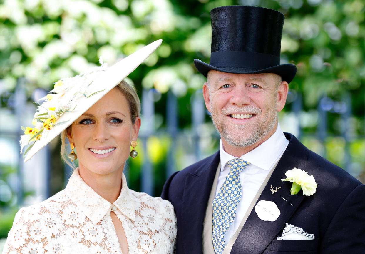 ASCOT, UNITED KINGDOM - JUNE 22: (EMBARGOED FOR PUBLICATIZara Tindall, wearing a large white hat with a white lace dress, and Mike Tindall, wearing a black top hat with a black tuxedo, attend day 3 'Ladies Day' of Royal Ascot 2023