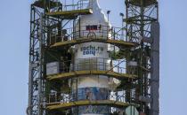 A specialist works on the Soyuz TMA-11M spacecraft decorated with 2014 Sochi Winter Olympic Games' patterns, set on its launch pad at the Baikonur cosmodrome November 5, 2013. The Soyuz spacecraft will carry Japanese astronaut Koichi Wakata, Russian cosmonaut Mikhail Tyurin and U.S. astronaut Rick Mastracchio to the International Space Station (ISS) on November 7. REUTERS/Shamil Zhumatov (KAZAKHSTAN - Tags: SCIENCE TECHNOLOGY)