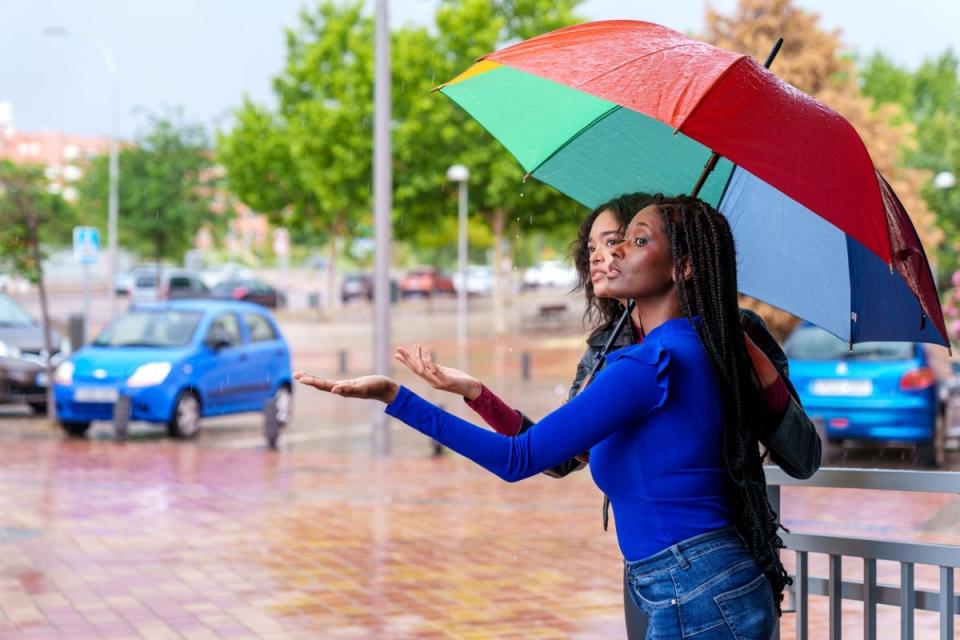 Checking outside for rain