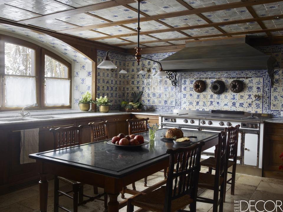 <p>This charming <span class="redactor-unlink">kitchen</span> in St. Moritz, Switzerland, is filled with history: 18th-century Portuguese tiles cover the <a href="https://www.elledecor.com/design-decorate/interior-designers/g3437/designer-tricks-to-make-ceilings-taller/" rel="nofollow noopener" target="_blank" data-ylk="slk:ceiling;elm:context_link;itc:0;sec:content-canvas" class="link ">ceiling</a> and <a href="https://www.elledecor.com/design-decorate/g8942056/open-floor-plans/" rel="nofollow noopener" target="_blank" data-ylk="slk:walls;elm:context_link;itc:0;sec:content-canvas" class="link ">walls</a>; the 19th-century <a href="https://www.elledecor.com/design-decorate/room-ideas/g8667274/french-decor-tips/" rel="nofollow noopener" target="_blank" data-ylk="slk:French;elm:context_link;itc:0;sec:content-canvas" class="link ">French</a> table is surrounded by English chairs from the same era and a 19th-century <a href="https://www.elledecor.com/celebrity-style/luxury-real-estate/a8716/castle-for-sale-in-france/" rel="nofollow noopener" target="_blank" data-ylk="slk:French;elm:context_link;itc:0;sec:content-canvas" class="link ">French</a> light fixture hangs above.<br></p>