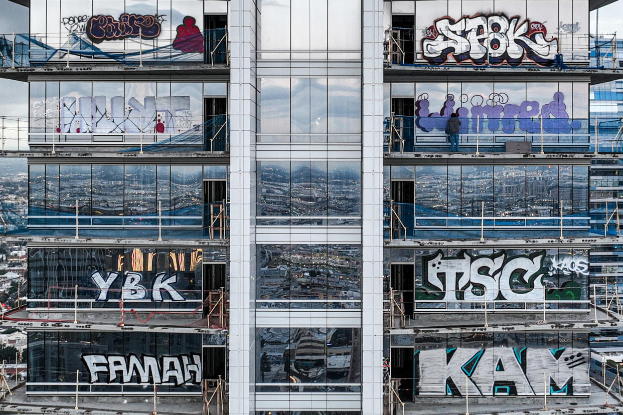 Graffiti slammed Oceanwide Plaza tower. (Robert Gauthier / Los Angeles Times via Getty Images file)