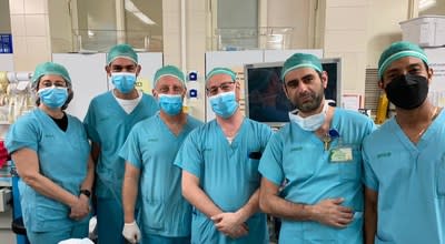 Drs. Ian White, Shimon Dolnikov and Alberto Moran, with the Exero Medical team after the first implantation at Beilinson Campus, Rabin Medical Center