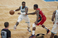 Charlotte Hornets guard Terry Rozier (3) is defended by New Orleans Pelicans guard Eric Bledsoe (5) during the second half of an NBA basketball game Sunday, May 9, 2021, in Charlotte, N.C. (AP Photo/Brian Westerholt)