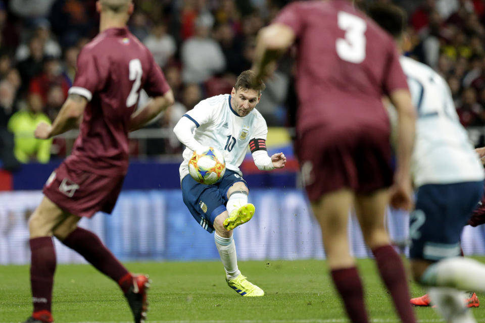 Argentina's Lionel Messi kicks the ball during an international friendly soccer match between Argentina and Venezuela at Wanda Metropolitano stadium in Madrid, Spain, Friday, March 22, 2019. (AP Photo/Bernat Armangue)